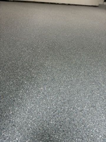 Stunning Garage Transformation with Epoxy Coating image