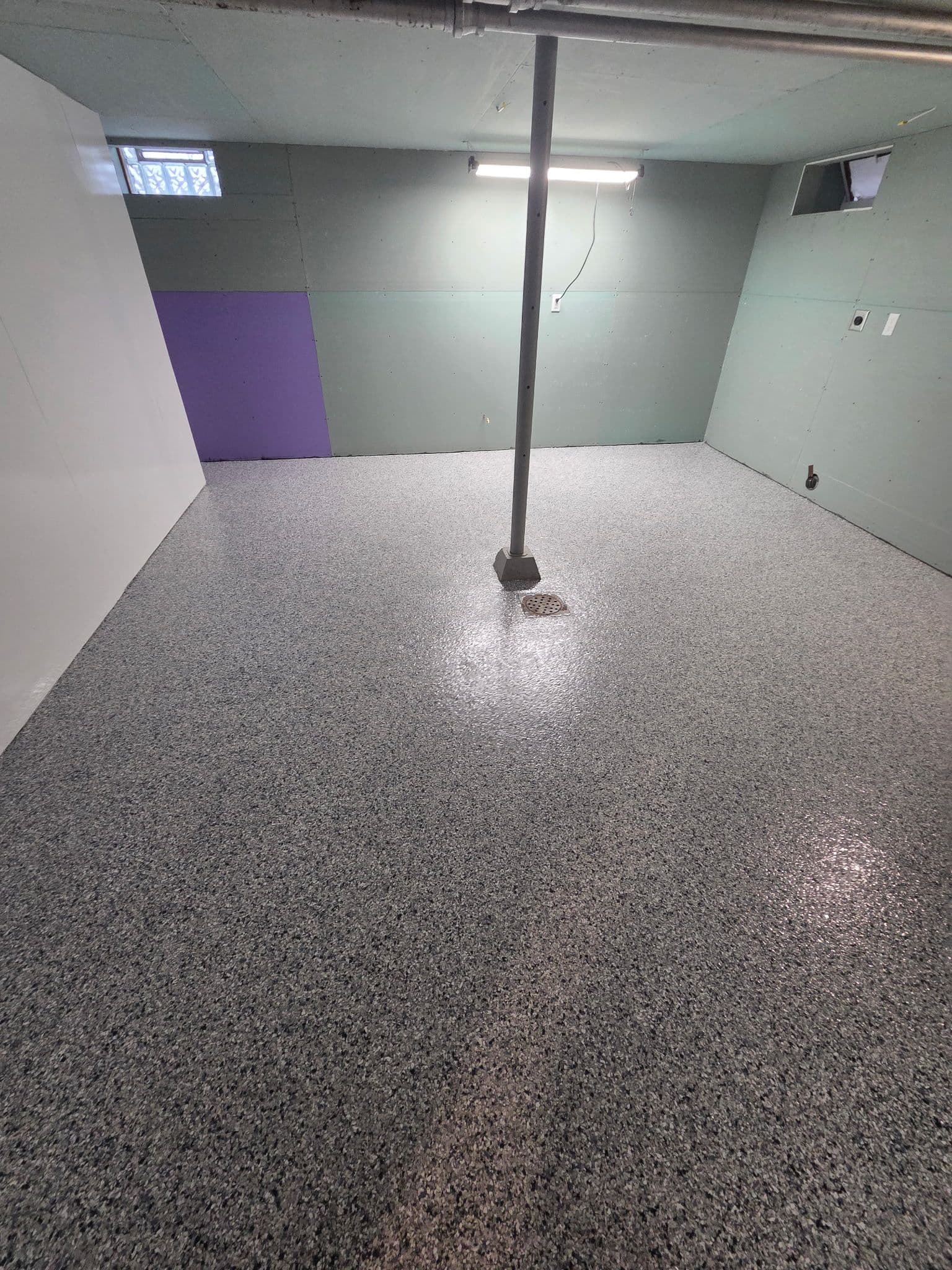 Cracked Laundry Room Floor Gets a Full Flake Epoxy Finish in Lakeville image