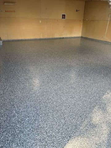 From Cracks to Epoxy Brilliance in the Garage image